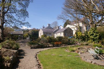 The landscaped gardens finished by utilizing the limestone blocks found on site