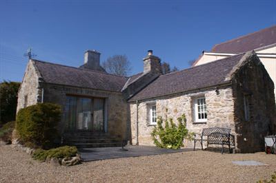 The stone clad extension and patio area. All built using lime mortar to match the existing farmhouse