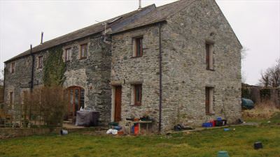 The stone clad extension, built using lime mortar to match the existing barn